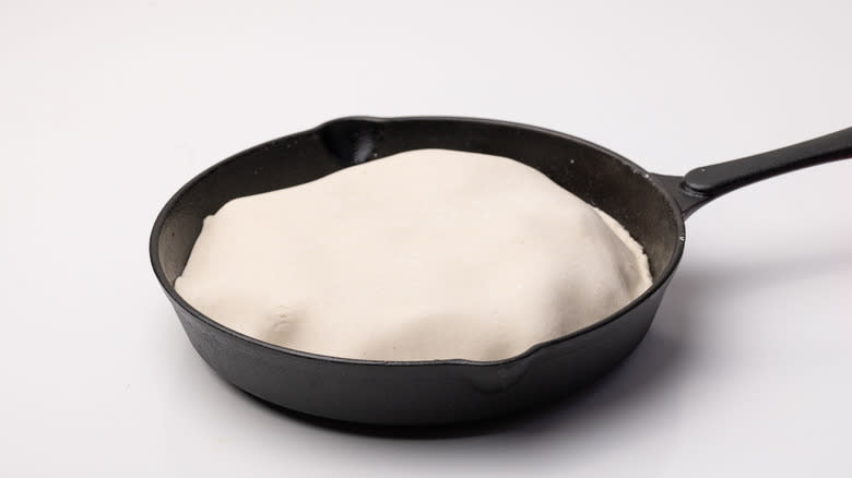placing pastry into pan