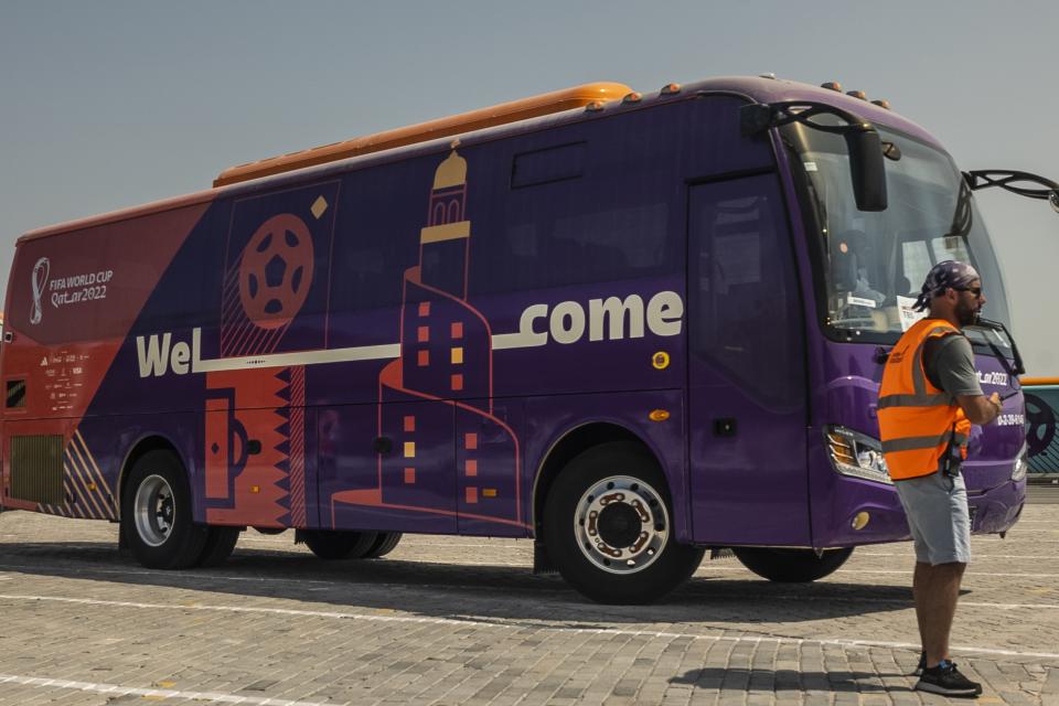 Buses are seen during a test run of massive bus fleet ahead of Qatar World Cup, in Doha, Qatar, Thursday, Sept. 22, 2022. Thani Al Zarraa, who is overseeing transport preparations, said some 4,000 buses will be used during the tournament, which around 700 will be electric. (AP Photo/ Lujain Jo)