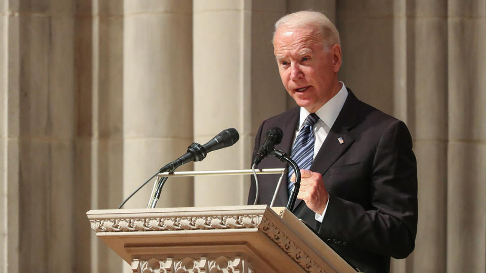 President Biden speaks during the funeral ceremony of former Sen. John Warner, R-Va., at Washington National Cathedral Wednesday. (Oliver Contreras/Pool via Reuters)