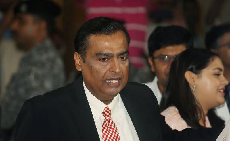 FILE PHOTO: Mukesh Ambani, Chairman and Managing Director of Reliance Industries, attends the company's annual general meeting in Mumbai