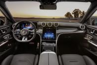 <p>The inside of the C 63 is vastly similar to its non-sporty counterpart. You'll find a thick-rimmed steering wheel backed by a digital display, along with a massive portrait-oriented infotainment screen in the dashboard. </p>