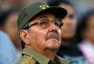 FILE PHOTO - Raul Castro looks up during an event in celebration of the 50th anniversary of the assault of the presidential palace during the regime of Fulgencio Batista, in Havana, Cuba March 13, 2007. REUTERS/Claudia Daut/File Picture