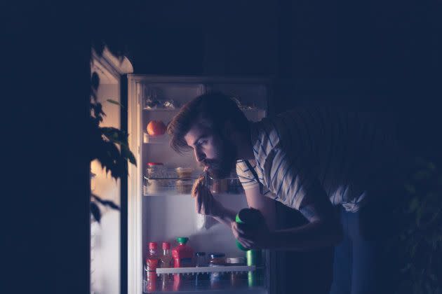 Late night snacking is a no-no. (Photo: domoyega via Getty Images)