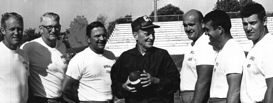 The fortunes of the 1969 Bengals rose and fell on the coaching efforts of Paul Brown, center, flanked by, left to right, Bill Walsh (receivers), Bill Johnson (offensive line), Jack Donaldson (offensive backs), Tom Ball (defense coordinator), Chuck Studley (defensive line) and Vince Costello (linebackers). Brown called that staff "the best I ever had."