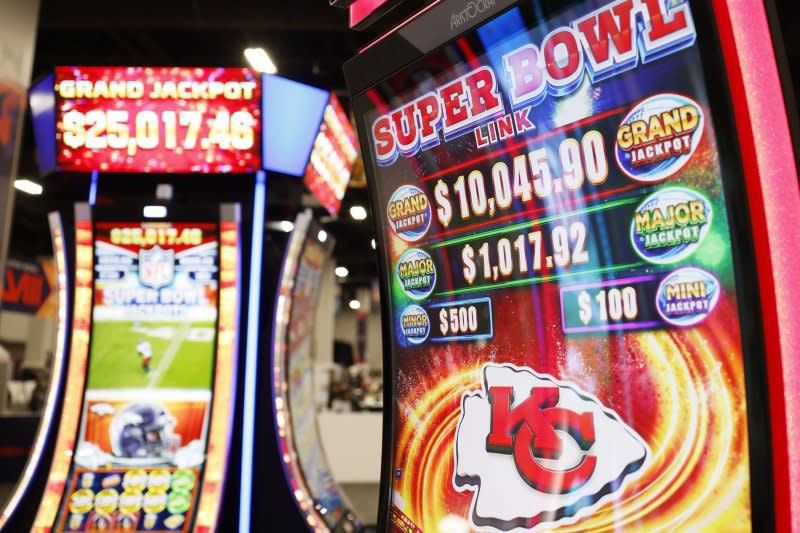 Super Bowl LVIII jackpots are shown on slot machines Monday at the Mandalay Bay Convention Center in Las Vegas. Photo by John Angelillo/UPI