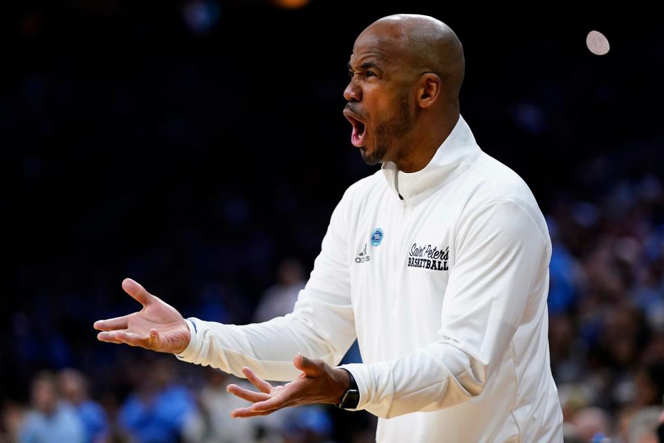 St. Peter's head coach Shaheen Holloway reacts during the first half of a college basketball game against North Carolina in the Elite 8 round of the NCAA tournament, Sunday, March 27, 2022, in Philadelphia. (AP Photo/Chris Szagola)