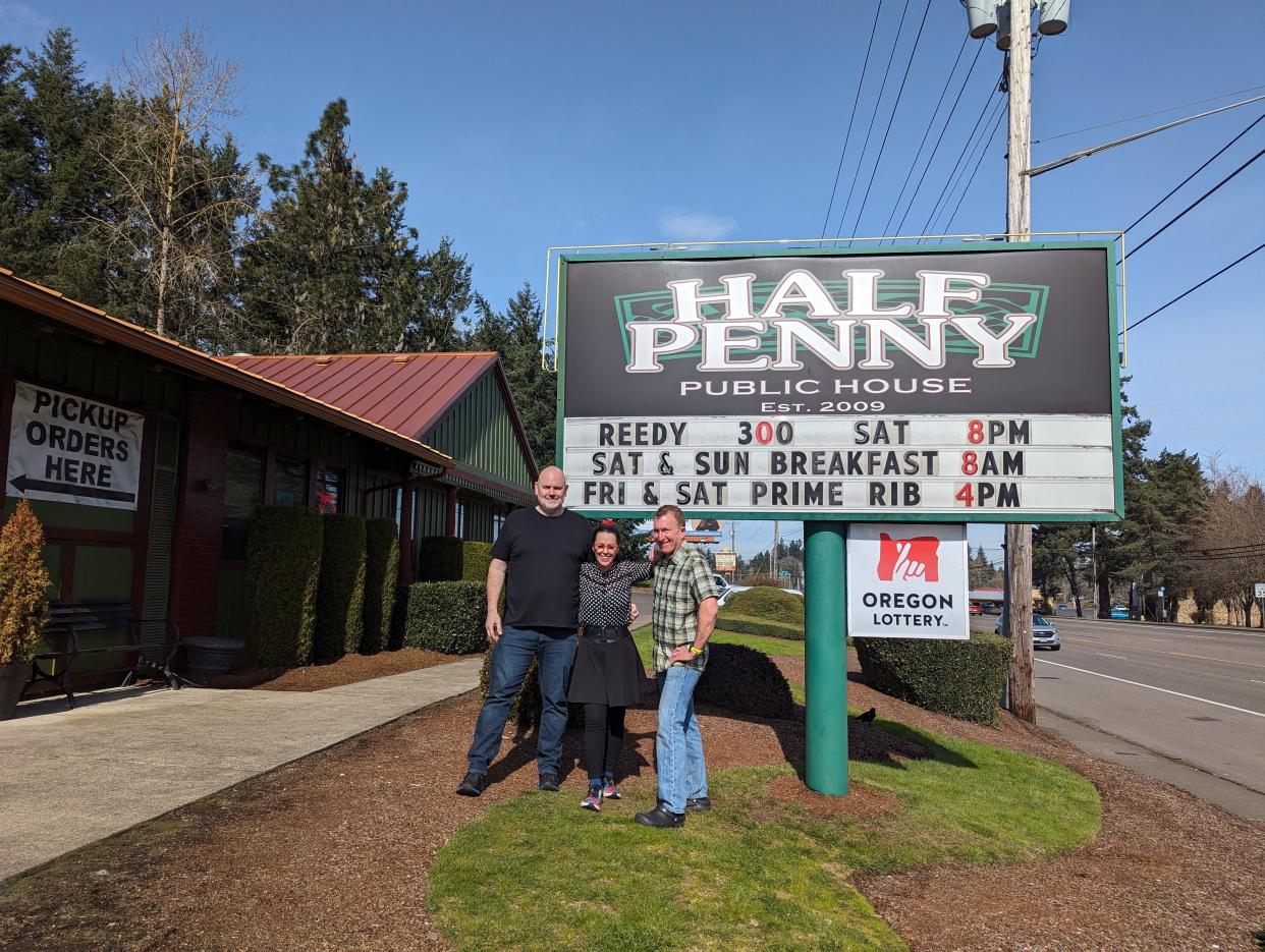 New owners James Kirkland and Wende Bennette-Kirkland with former owner Monty Miller at the Half Penny Public House.