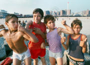 <p>Boys on Coney Island Beach. (Photograph by Paul Hosefros/NYC Parks Photo Archive/Caters News) </p>