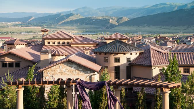 Rich neighborhood Solterra in Denver with the Rocky Mountains on the background.