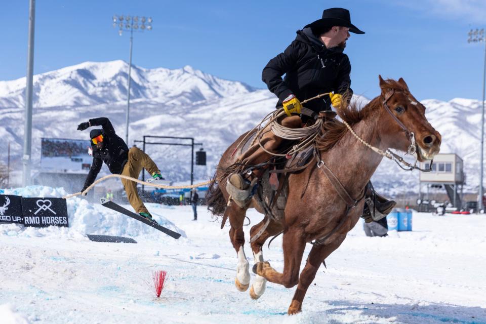 A skier loses their balance after coming off a jump during the 2024 Utah Skijoring competition at the Wasatch County Event Complex in Heber City on Saturday, Feb. 17, 2024. | Marielle Scott, Deseret News