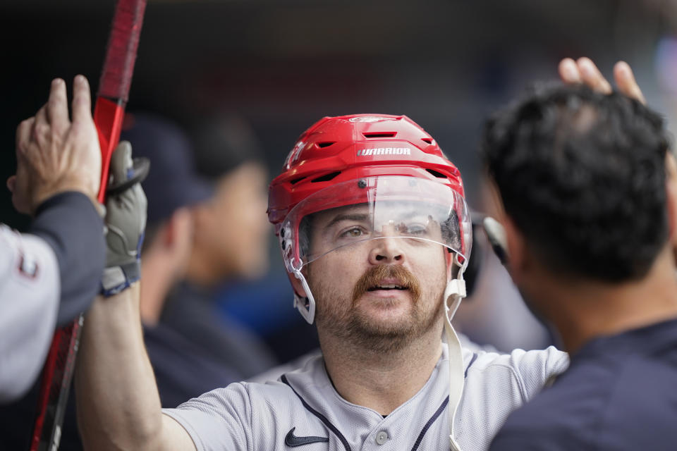 Detroit Tigers' Jake Rogers celebrates in the dugout after hitting a three-run home run during the third inning of a baseball game against the Los Angeles Angels, Sunday, Sept. 17, 2023, in Anaheim, Calif. (AP Photo/Ryan Sun)