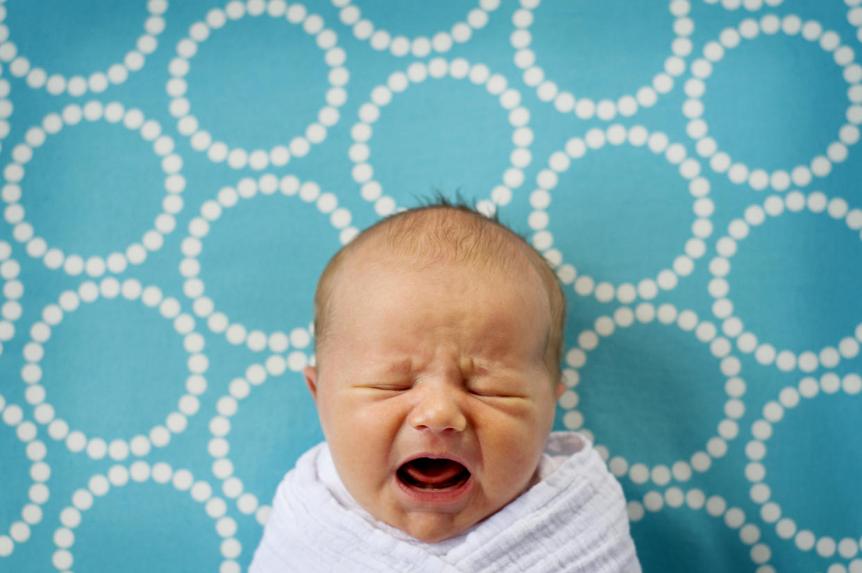 Could a tongue, lip or cheek-tie be the reason your baby is crying or struggling to feed? Doctors say the condition is common and often passed through genetics. (Photo: Getty Creative)