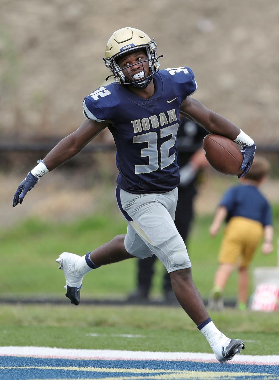 Hoban running back Lamar Sperling scores an 89-yard rushing touchdown during the second half of a high school football game against Iona Prep, Saturday, Sept. 3, 2022, in Akron, Ohio.