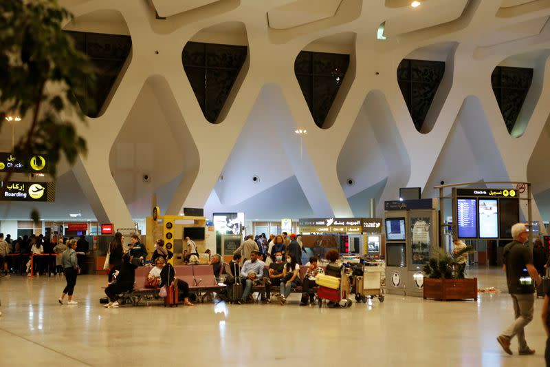 Tourists wait to be repatriated to their countries from Marrakech airport