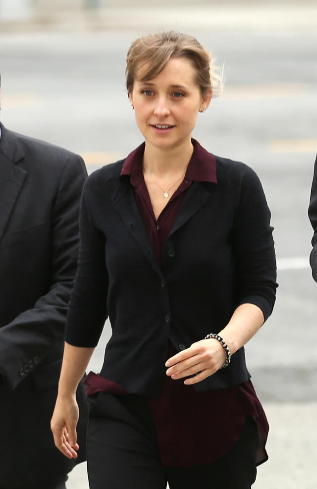 Actress Allison Mack dressed down for court appearances to face sex trafficking charges. (Photo: Getty Images)