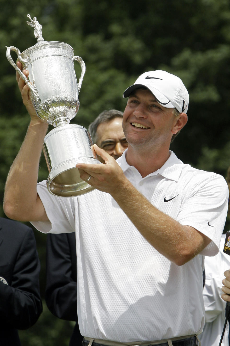 FILE - In this June 22, 2009, file photo, Lucas Glover holds his trophy after winning the U.S. Open Golf Championship at Bethpage State Park's Black Course in Farmingdale, N.Y. The COVID-19 pandemic, which already has postponed the U.S. Open from June to September, has forced the USGA to do away with qualifying for the first time since 1924. (AP Photo/Morry Gash)