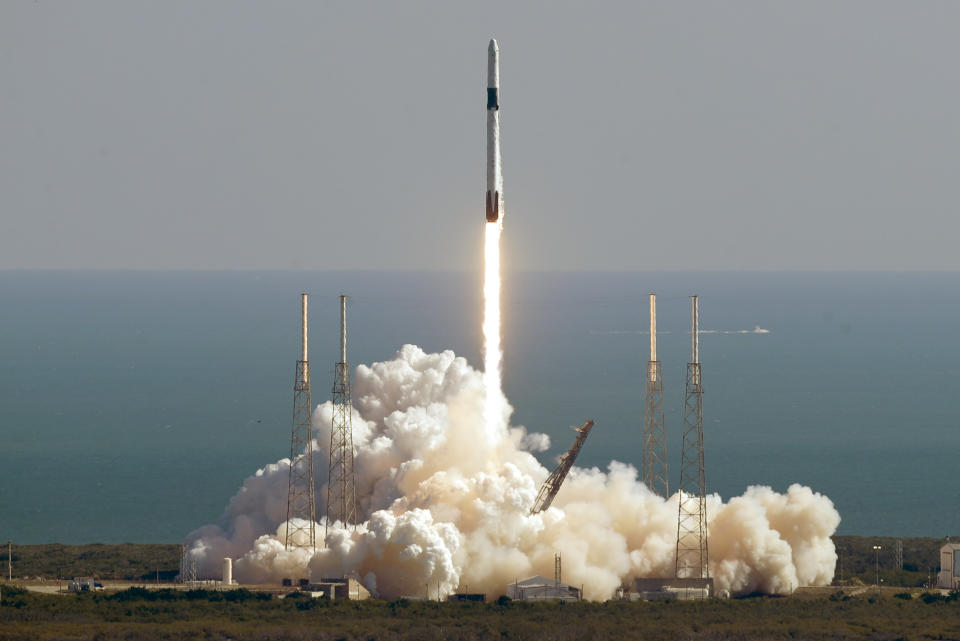 A Falcon 9 SpaceX rocket on a resupply mission to the International Space Station lifts off from Space Launch Complex 40 at Cape Canaveral Air Force Station in Cape Canaveral, Fla., Thursday, Dec. 5, 2019. (AP Photo/John Raoux)