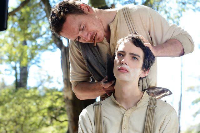 PARISA TAGHIZADEH/A24 Michael Fassbender (standing) and Kodi Smit-McPhee in 'Slow West'