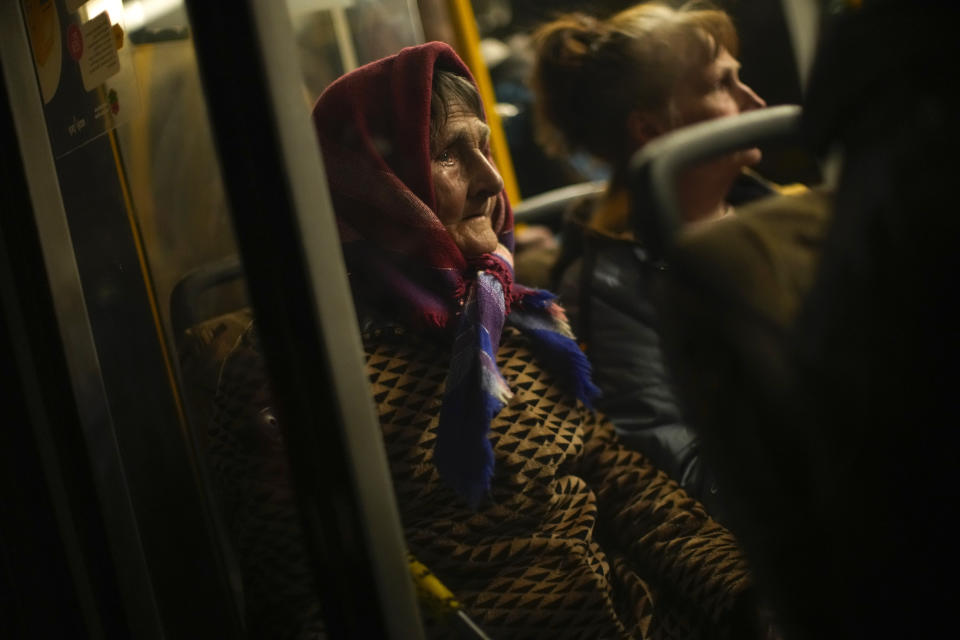 People who fled from Mariupol, a few from the Azovstal steel plant, arrive by bus at a reception center for displaced people in Zaporizhzhia, Ukraine, Sunday, May 8, 2022. (AP Photo/Francisco Seco)