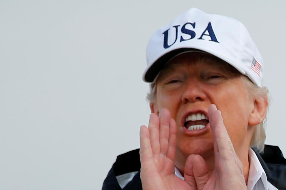 <p>President Donald Trump answers a reporter’s question as he boards Air Force One for travel to view Hurricane Irma response efforts in Florida, from Joint Base Andrews, Md., Sept. 14, 2017. (Photo: Jonathan Ernst/Reuters) </p>