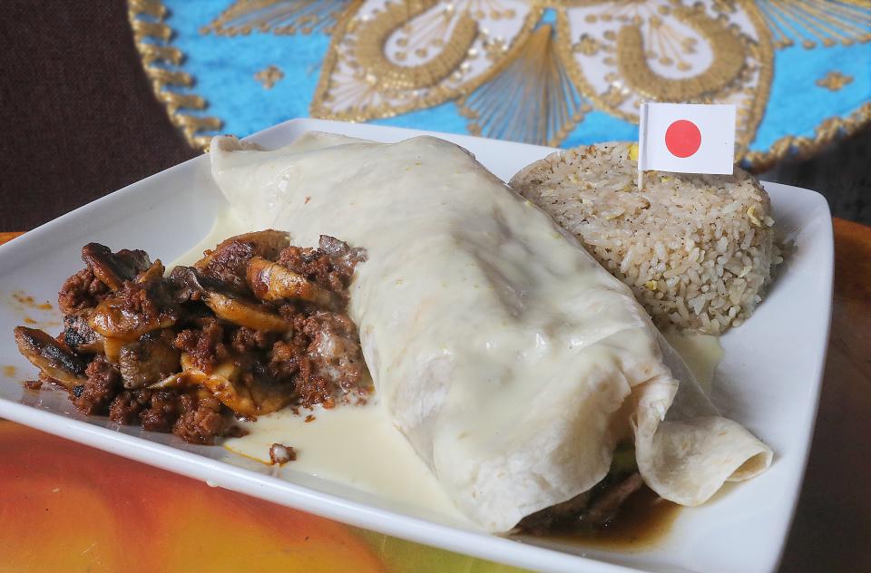 Mexibachi Grill's signature dish, burrito Mexibachi, fuses Mexican and Japanese flavors.