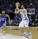 North Carolina forward Luke Maye (32) shoots the winning basket as Kentucky guard Isaiah Briscoe (13) defends in the second half of the South Regional final game in the NCAA college basketball tournament Sunday, March 26, 2017, in Memphis, Tenn. The basket gave North Carolina a 75-73 win. (AP Photo/Mark Humphrey)