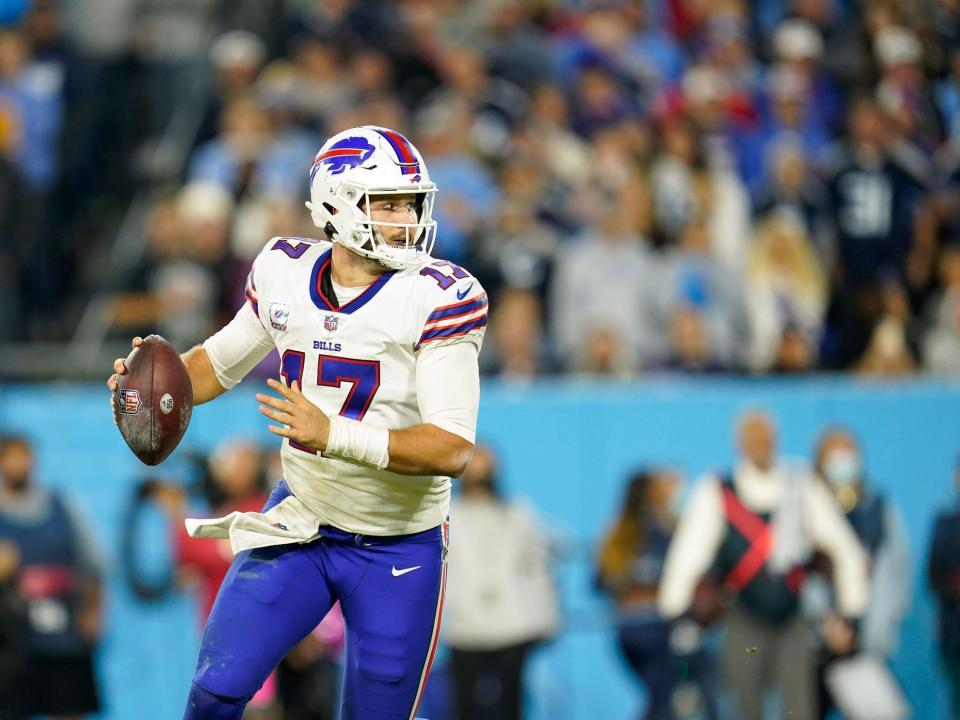 Josh Allen looks to throw against the Tennessee Titans.