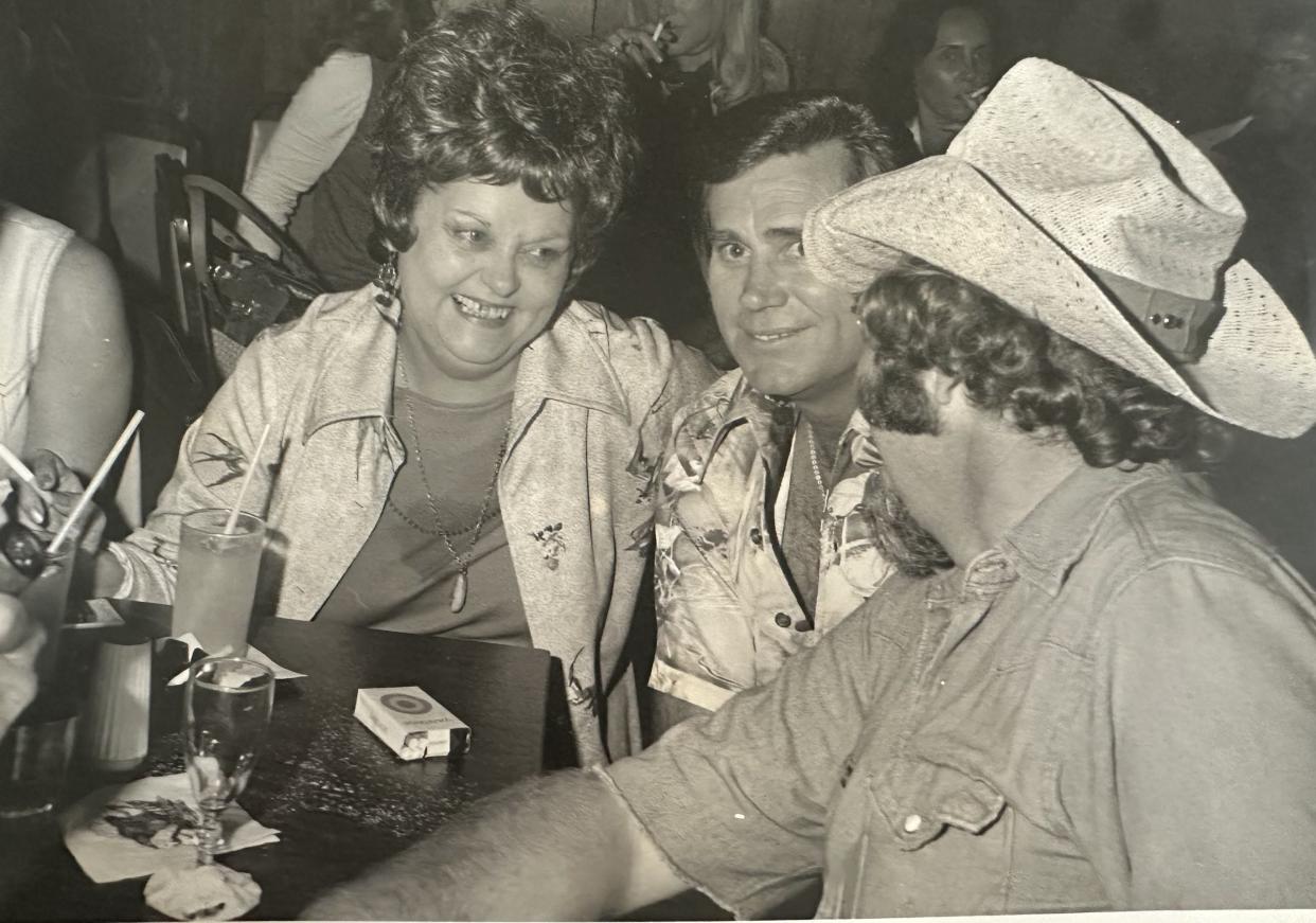 Sue Brewer pictured with George Jones and Hank Williams Jr., year unknown.