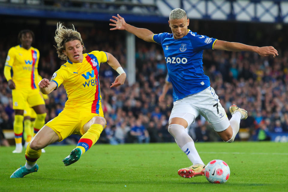 LIVERPOOL, ENGLAND - MAY 19: Richarlison of Everton scores his side's second goal beyond Conor Gallagher of Crystal Palace during the Premier League match between Everton and Crystal Palace at Goodison Park on May 19, 2022 in Liverpool, England. (Photo by James Gill - Danehouse/Getty Images)