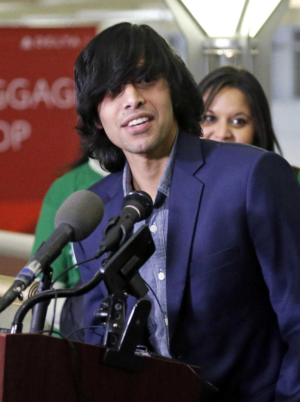 Shezanne Cassim speaks during a news conference after he arrived at the Minneapolis-St. Paul International Airport in Minneapolis on Thursday, Jan. 9, 2014 after being held in a maximum security prison since June 2013 in the United Arab Emirates for a parody video that was posted online. (AP Photo/Jim Mone)