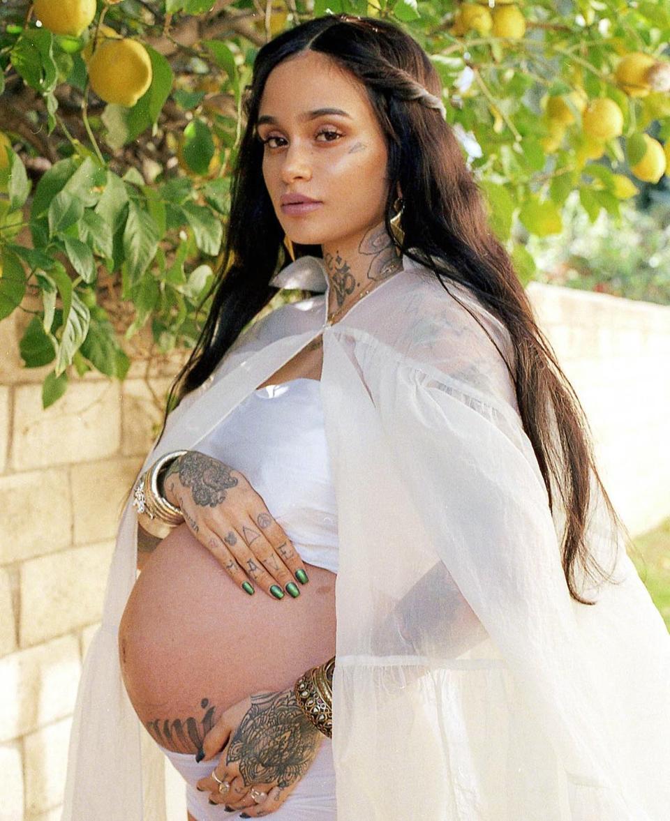 Kehlani’s new photo shoot, which she posted to her Instagram, shows off some of her unconventional maternity wear.