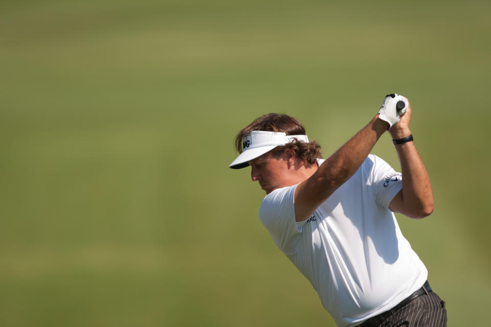 IRVING, TX - MAY 17: Phil Mickelson plays a tee shot at the third hole during the first round of the HP Byron Nelson Championship at TPC Four Seasons Resort on May 17, 2012 in Irving, Texas. (Photo by Darren Carroll/Getty Images)