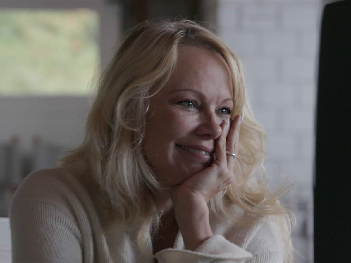 Pamela Anderson watches old home tapes in Netflix’s ‘Pamela, A Love Story’  (Netflix)