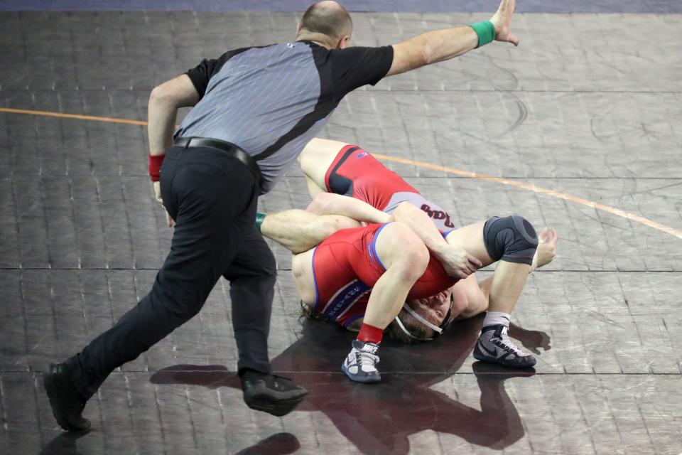 Jordan Podest of Westmoore, right, wrestles Caden Kelleyof Bixby in a Class 6A 144-pound semifinal match during the Oklahoma state wrestling tournament at State Fair Arena in Oklahoma City, Friday, Feb. 24, 2023. 