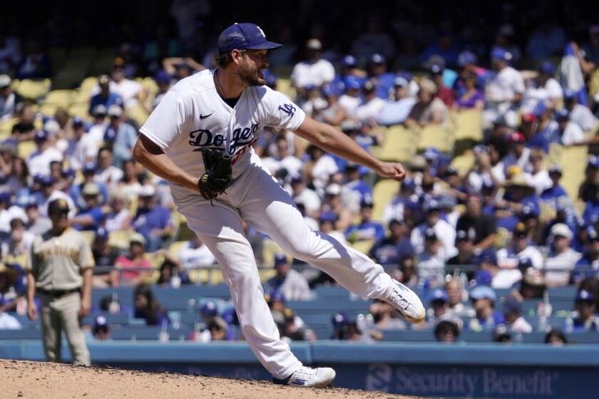 Los Angeles Dodgers starting pitcher Clayton Kershaw throws to the plate during the seventh inning.