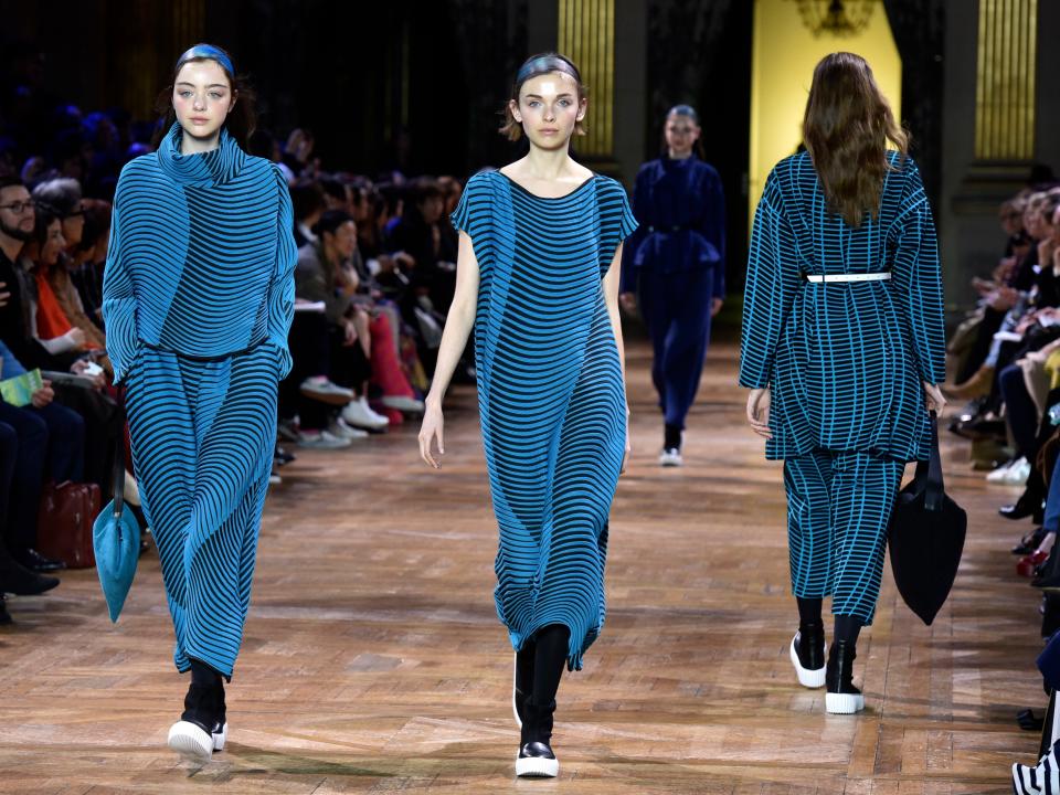 Models wear creations for Issey Miyake's Fall-Winter 2017-2018 ready-to-wear fashion collection presented Friday, March 3, 2017 in Paris.