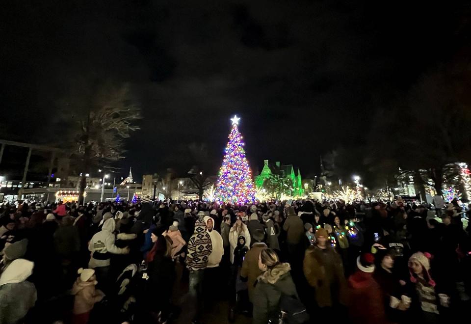 Nearly 1,000 people came out to watch Erie's Christmas tree light up Friday during Downtown D'Lights.