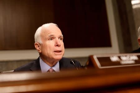 FILE PHOTO: Committee chairman Senator John McCain (R-AZ) asks a question during a Senate Armed Services Committee hearing on the Marines United Facebook page on Capitol Hill in Washington, D.C., U.S. March 14, 2017. REUTERS/Aaron P. Bernstein/File Photo