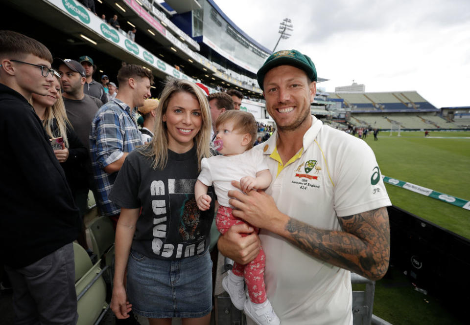 James Pattinson of Australia celebrates with wife Kayla Pattinson and daughter Lilah after day five of the 1st Specsavers Ashes Test. (Photo by Ryan Pierse/Getty Images)