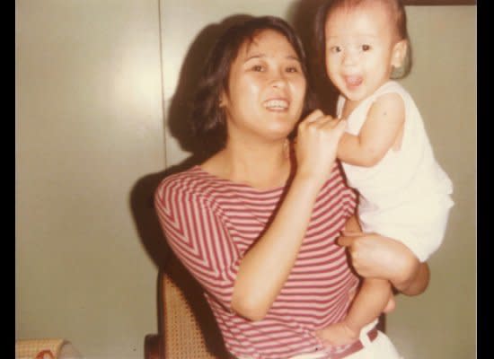 "My beautiful mother Christina Almendrala at age 25, holding me. She's sporting a short feathered hairdo and is wearing a red and white striped bateau blouse tucked into high-waisted white pants. Photo taken in Manila, Philippines." - Anna Almendrala, associate editor, HuffPost Los Angeles    (HP photo)