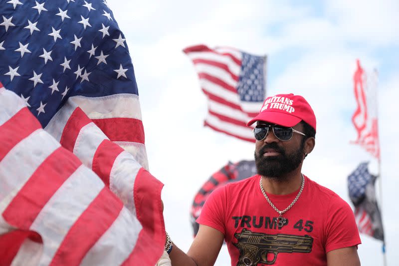 Supporters of former U.S. President Donald Trump gather outside his Mar-a-Lago resort