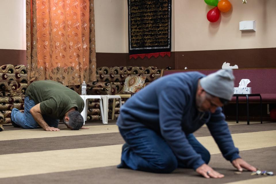 Mosque members worship at the Al-Zahrah Islamic Center on Bishop Lane during afternoon prayer. March 25, 2022