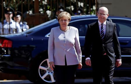 Czech Republic's Prime Minister Bohuslav Sobotka welcomes German Chancellor Angela Merkel at the government headquarters in Prague, Czech Republic August 25, 2016. REUTERS/David W Cerny