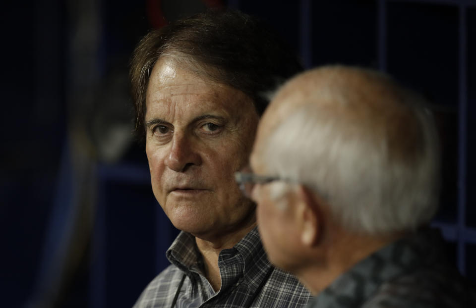 Former manager Tony La Russa, left, before a baseball game between the Tampa Bay Rays and the Boston Red Sox Friday, April 19, 2019, in St. Petersburg, Fla. (AP Photo/Chris O'Meara)