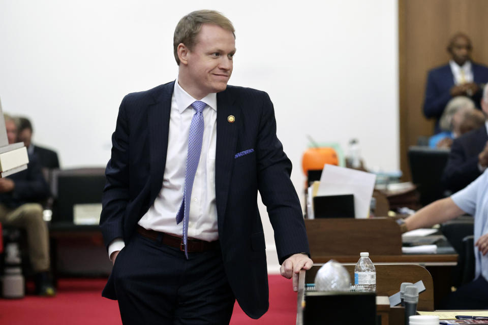 Rep. Destin Hall, R-Caldwell, relaxes as the session draws to a close after lawmakers debated over redistricting bills at the Legislative Building, Tuesday, Oct. 24, 2023, in Raleigh, N.C. (AP Photo/Chris Seward)