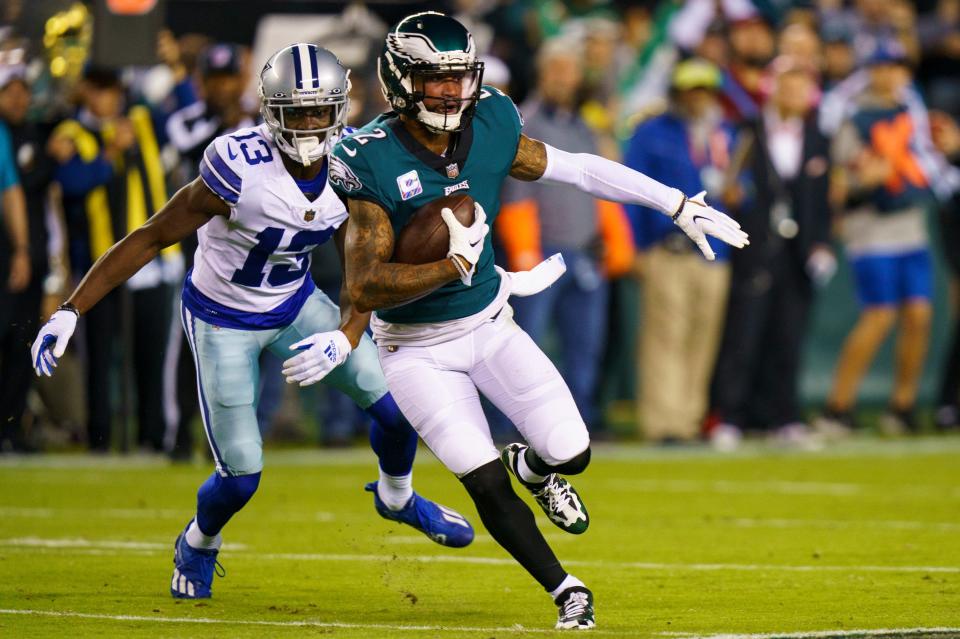 Philadelphia Eagles cornerback Darius Slay (2) with the interception as Dallas Cowboys wide receiver Michael Gallup (13) tried to chase him down on Sunday, Oct. 16, 2022, in Philadelphia.