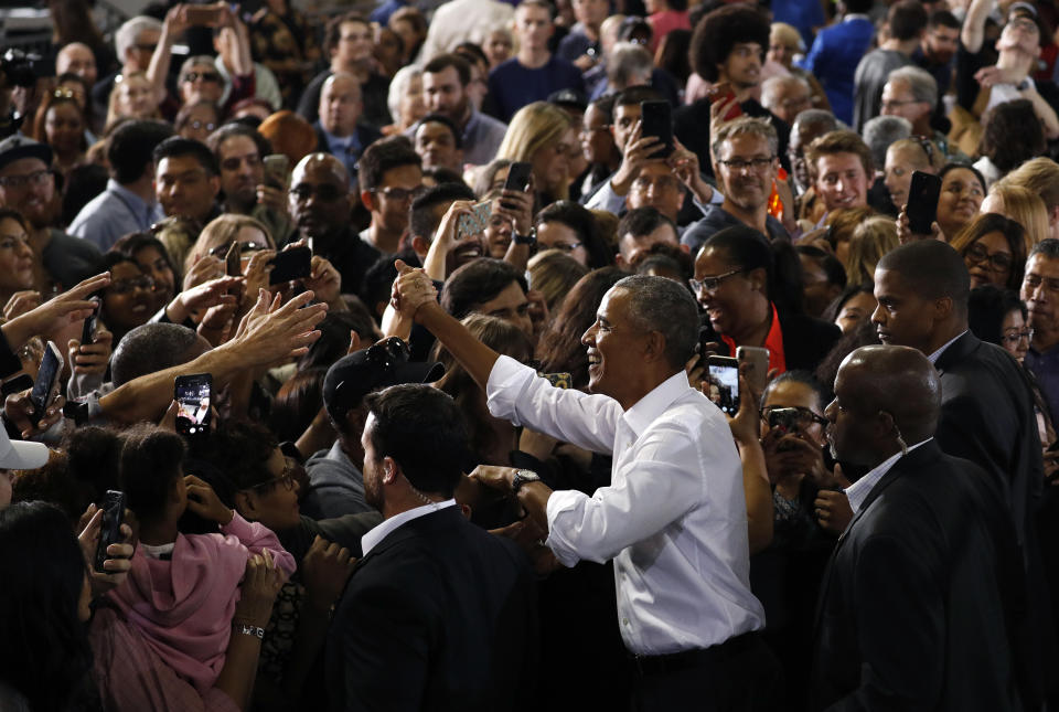Former President Barack Obama meets with people at a rally for Senate candidate Jacky Rosen and other Nevada Democrats, Monday, Oct. 22, 2018, in Las Vegas. (AP Photo/John Locher)