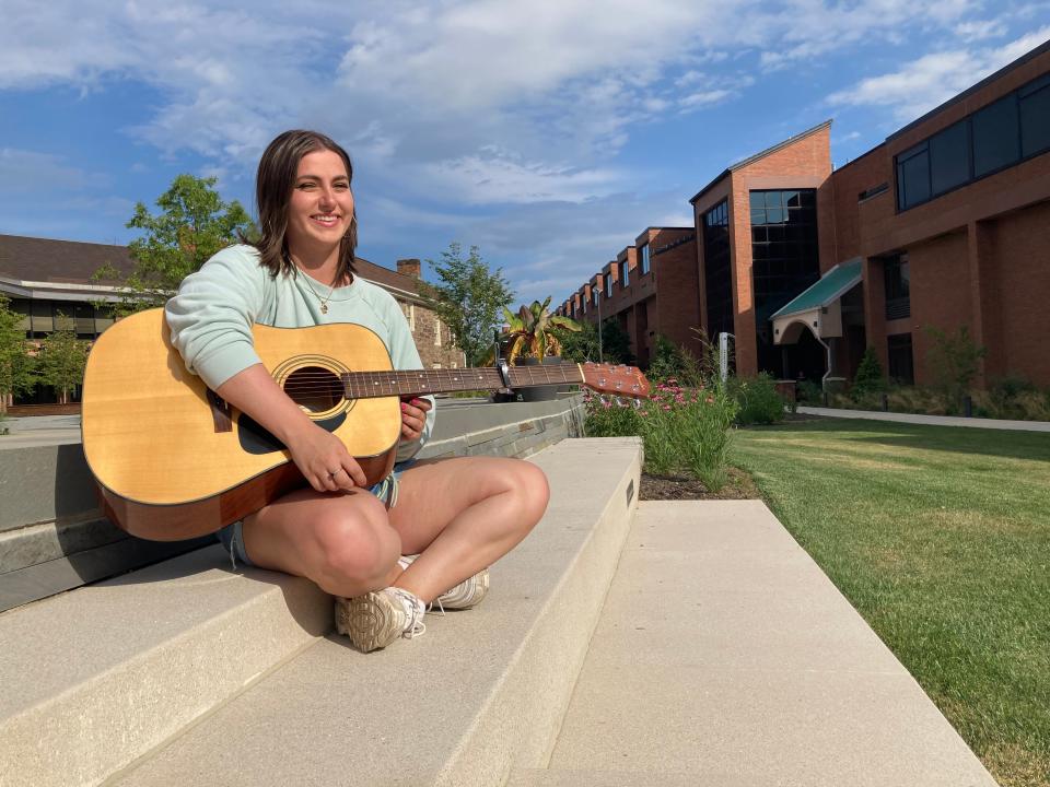 Singer and songwriter Capri Wagner, on the campus of Bucks County Community College in Newtown. wrote a tribute to her late father, John. “He always wanted to be with us, all the time. When the pandemic came, it was clearly a sad time for a lot of people, but he enjoyed that time, spending it with the family,” she said.