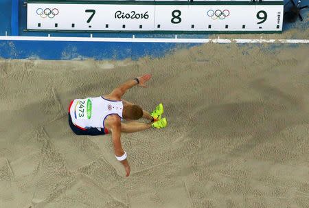 2016 Rio Olympics - Athletics - Preliminary - Men's Long Jump Qualifying Round - Groups - Olympic Stadium - Rio de Janeiro, Brazil - 12/08/2016. Greg Rutherford (GBR) of Britain competes. REUTERS/Pawel Kopczynski