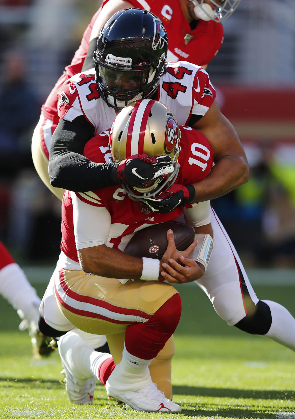 Atlanta Falcons defensive end Vic Beasley (44) sacks San Francisco 49ers quarterback Jimmy Garoppolo (10) during the first half of an NFL football game in Santa Clara, Calif., Sunday, Dec. 15, 2019. (AP Photo/John Hefti)